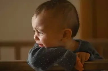 Debate on "Cry It Out" Parenting Method: Psychologists Clash Over Infant Development and Attachment